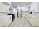 Spacious kitchen with modern appliances, white cabinets, stylish countertop, and great lighting at 4324 El Conlon Ave, Las Vegas, NV 89102