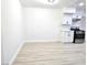 A minimalistic kitchen design with white cabinets and modern appliances at 4324 El Conlon Ave, Las Vegas, NV 89102