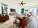 Staged living room with contemporary furnishings and a cozy layout; open to the kitchen at 4324 El Conlon Ave, Las Vegas, NV 89102
