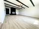 Spacious living room with wood beam ceiling and stylish fireplace at 4324 El Conlon Ave, Las Vegas, NV 89102