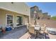 Relaxing outdoor patio features a brick design, ideal for entertaining or enjoying outdoor meals at 4364 Contour Bend Ave, North Las Vegas, NV 89084