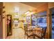 Cozy kitchen features bright white cabinets, a gas range, and an adjacent breakfast nook for casual dining at 4539 Peardale Dr, Las Vegas, NV 89147