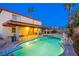 Private backyard pool with diving board and lounging area at 4539 Peardale Dr, Las Vegas, NV 89147