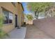 Backyard featuring a patio area, rock landscaping, and a perimeter privacy wall at 5324 Pendergrass St, North Las Vegas, NV 89081