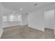 A carpeted loft offers recessed lighting, neutral paint and many possibilities at 5677 Asyma Ct, Las Vegas, NV 89113