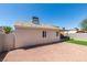 This backyard boasts a clean, modern aesthetic with a well-maintained gravel area and lush artificial grass at 5742 Forsythe Dr, Las Vegas, NV 89142