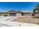 Attractive one-story home featuring a two-car garage, desert landscaping, and a neutral color scheme at 5742 Forsythe Dr, Las Vegas, NV 89142