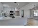 Modern kitchen featuring white cabinets, quartz countertops, and stainless steel appliances at 5742 Forsythe Dr, Las Vegas, NV 89142