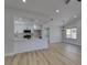 Open floor plan showcasing the living room and kitchen, with modern finishes and natural light at 5742 Forsythe Dr, Las Vegas, NV 89142