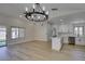 Bright open concept dining area leading into the updated kitchen with white cabinets at 5742 Forsythe Dr, Las Vegas, NV 89142