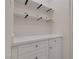 Bright mudroom with custom shelving, drawers, and countertop at 5751 E Hacienda Ave # 159, Las Vegas, NV 89122