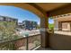 Exterior view from balcony showcasing the neighborhood and nearby building at 5855 Valley Dr # 2092, North Las Vegas, NV 89031