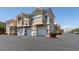 Inviting multi-Gathering home featuring well-maintained landscaping, attached garages, and ample parking spaces at 5855 Valley Dr # 2092, North Las Vegas, NV 89031