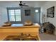 Bright living room with large window, stylish decor, and a sink view at 5855 Valley Dr # 2092, North Las Vegas, NV 89031