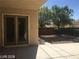 Backyard patio area with mature trees, creating an inviting space at 6245 Hawthorn Woods Ave, Las Vegas, NV 89130