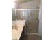 Bathroom featuring a glass-enclosed shower and vanity at 6245 Hawthorn Woods Ave, Las Vegas, NV 89130