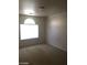Standard bedroom with a window allowing natural light in at 6245 Hawthorn Woods Ave, Las Vegas, NV 89130