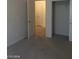 Bedroom with access to hallway, closet, and carpeting at 6245 Hawthorn Woods Ave, Las Vegas, NV 89130