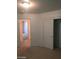 Bedroom featuring closet, neutral carpet and view of the hallway at 6245 Hawthorn Woods Ave, Las Vegas, NV 89130