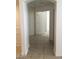 Hallway featuring tile flooring and an arched entry at 6245 Hawthorn Woods Ave, Las Vegas, NV 89130