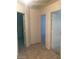 Hallway with tile flooring leading to bedrooms and other living spaces at 6245 Hawthorn Woods Ave, Las Vegas, NV 89130