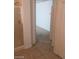 Hallway view from a bathroom, leading to another room at 6245 Hawthorn Woods Ave, Las Vegas, NV 89130