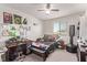 Well lit bedroom featuring decor, study desk, and a comfortable bed at 6313 Voss St, North Las Vegas, NV 89081
