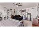 Bedroom featuring eclectic decor, soft lighting, and a comfortable seating area at 6313 Voss St, North Las Vegas, NV 89081