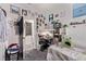 Well-decorated bedroom with a desk, vanity area, and charming decor, creating a personalized space at 6313 Voss St, North Las Vegas, NV 89081