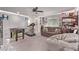 Recreational room includes treadmill, foosball table, couch, and bean bag chair at 6313 Voss St, North Las Vegas, NV 89081
