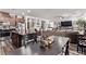 Spacious living space features an open floorplan connecting the kitchen, dining, and living areas at 6313 Voss St, North Las Vegas, NV 89081