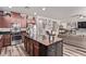 The open concept layout integrates the kitchen with the living space for easy entertaining at 6313 Voss St, North Las Vegas, NV 89081
