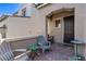 Welcoming front porch with comfortable seating, ideal for relaxing and enjoying the outdoors at 6313 Voss St, North Las Vegas, NV 89081