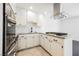 Modern kitchen with stainless appliances, gas cooktop, and granite counters offers updated appeal at 6330 Spring Meadow Dr, Las Vegas, NV 89103