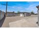 Spacious backyard with concrete and dirt space and a detached garage at 636 Burton St, Henderson, NV 89015