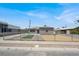 Charming single-story home featuring a fenced front yard and neutral gray paint at 636 Burton St, Henderson, NV 89015