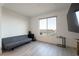 Sitting area of the home featuring a large window and modern furniture at 6486 Vanhoven Crest St, Las Vegas, NV 89166