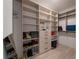 Well-organized walk-in closet featuring built-in shelving, drawers, and ample storage space at 6486 Vanhoven Crest St, Las Vegas, NV 89166