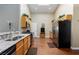 Well-lit kitchen featuring stainless steel appliances and wooden cabinetry at 672 Hitchen Post Dr, Henderson, NV 89011