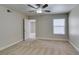 Bedroom with a neutral color palette, window, and plush carpeting at 6800 E Lake Mead Blvd # 2072, Las Vegas, NV 89156
