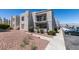 Well-maintained apartment complex with assigned parking spaces and lush landscaping at 6800 E Lake Mead Blvd # 2072, Las Vegas, NV 89156