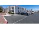Exterior view of the apartment building with parking spaces at 6800 E Lake Mead Blvd # 2072, Las Vegas, NV 89156