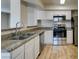 Updated kitchen with stainless steel appliances and granite countertops at 6800 E Lake Mead Blvd # 2072, Las Vegas, NV 89156