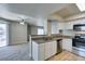 Well-lit kitchen area with stainless steel appliances and granite countertops at 6800 E Lake Mead Blvd # 2072, Las Vegas, NV 89156