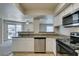 Modern kitchen with stainless steel appliances and granite countertops at 6800 E Lake Mead Blvd # 2072, Las Vegas, NV 89156