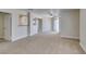 Spacious living room with soft carpet, ceiling fan, and sliding glass door at 6800 E Lake Mead Blvd # 2072, Las Vegas, NV 89156