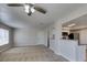 Bright living area with new carpet and open access to the kitchen at 6800 E Lake Mead Blvd # 2072, Las Vegas, NV 89156