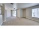 Open and airy living room with sliding glass doors to the balcony at 6800 E Lake Mead Blvd # 2072, Las Vegas, NV 89156