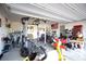 Spacious garage area featuring an open layout ideal for setting up a home gym or storage space at 7037 Tilligerry St, North Las Vegas, NV 89084