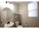 Functional half bathroom with a pedestal sink, neutral wall color, and ample lighting at 7037 Tilligerry St, North Las Vegas, NV 89084